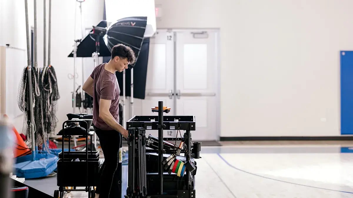 a Charter & Co camera assistant works on a Chicago video production