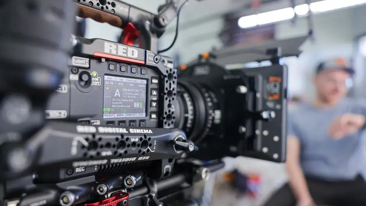 a RED digital cinema camera captures the action during a product video production