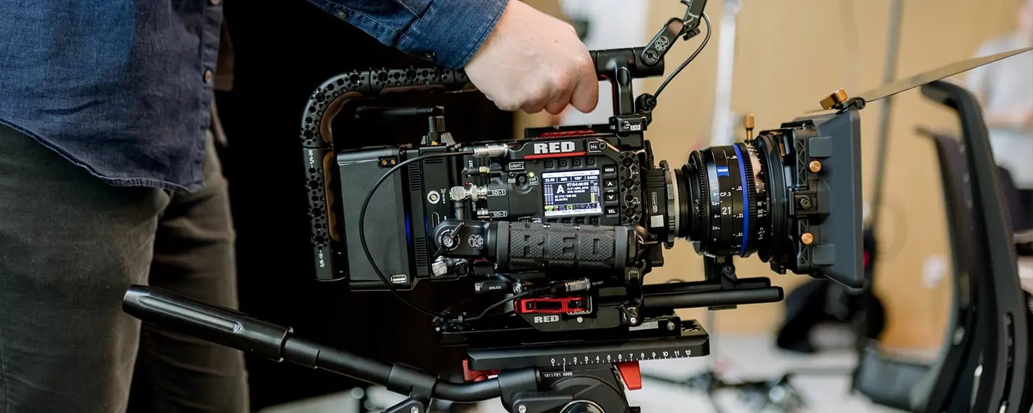 a RED cinema camera in use on a video production project