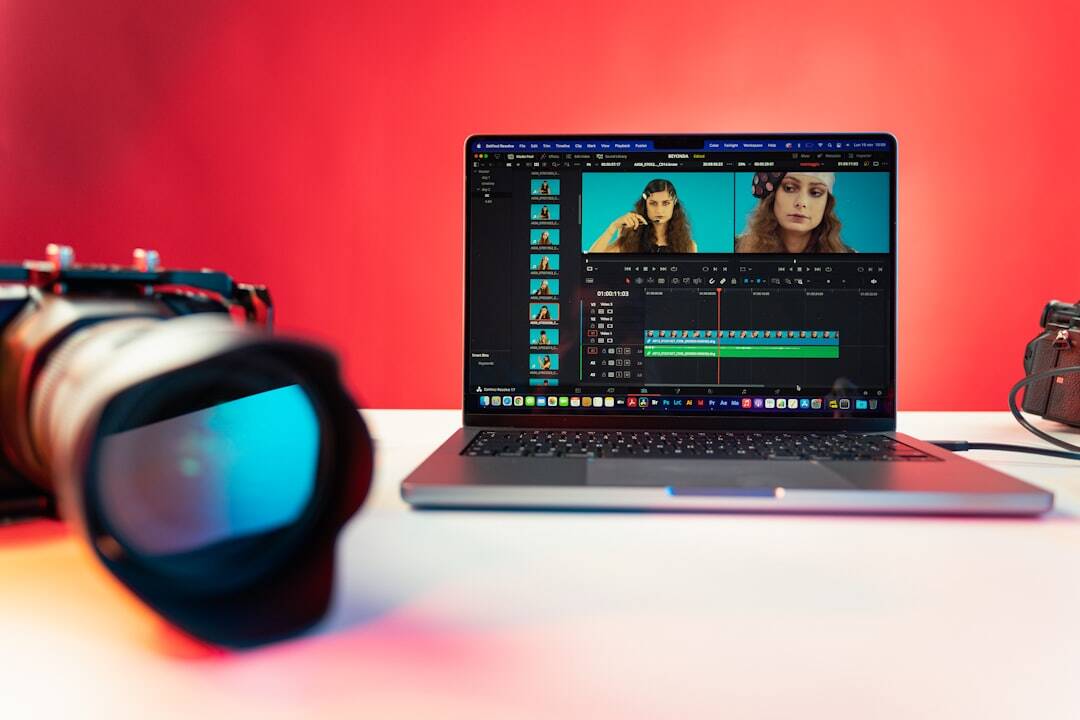 camera and laptop on a table to repurpose video content